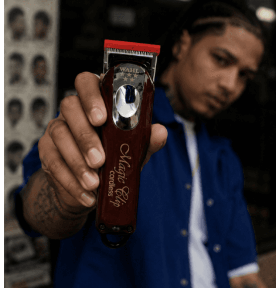 Barber holding Wahl clipper